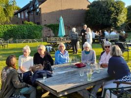 Members and partners with guests enjoy the social Petanque and Bar b Q evening